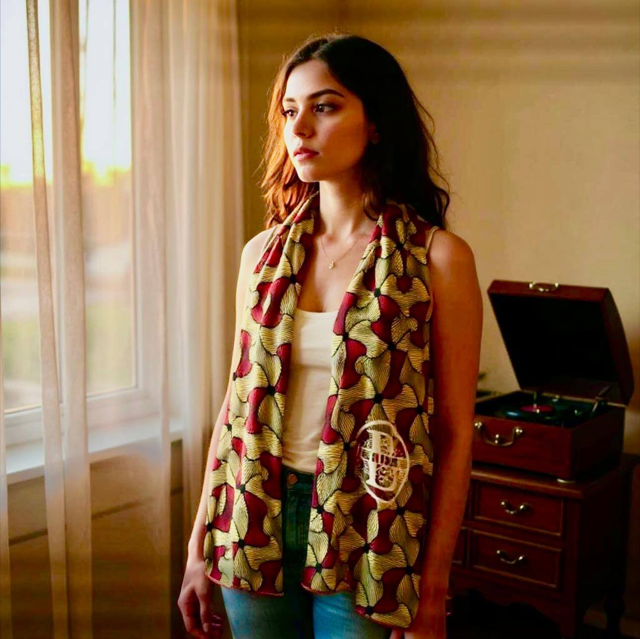 Cheleb Burgundy and gold scarf worn by a model, showcasing its unique design and texture as a stylish gold scarf.